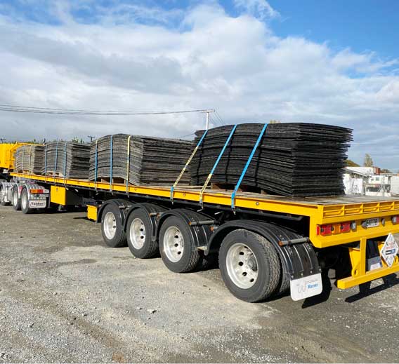 300 ground protection mats loaded on a flat deck truck